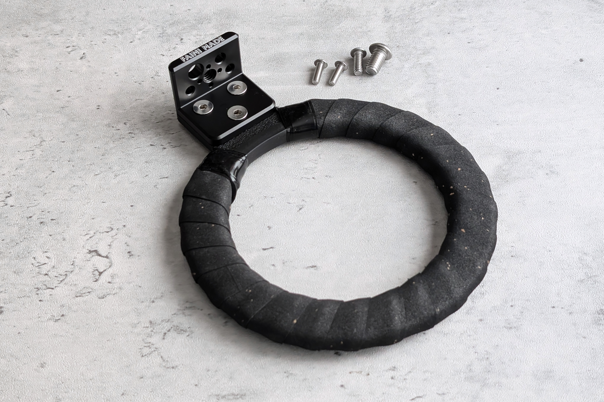 Camera Holster ring bracket and mounting hardware laid out