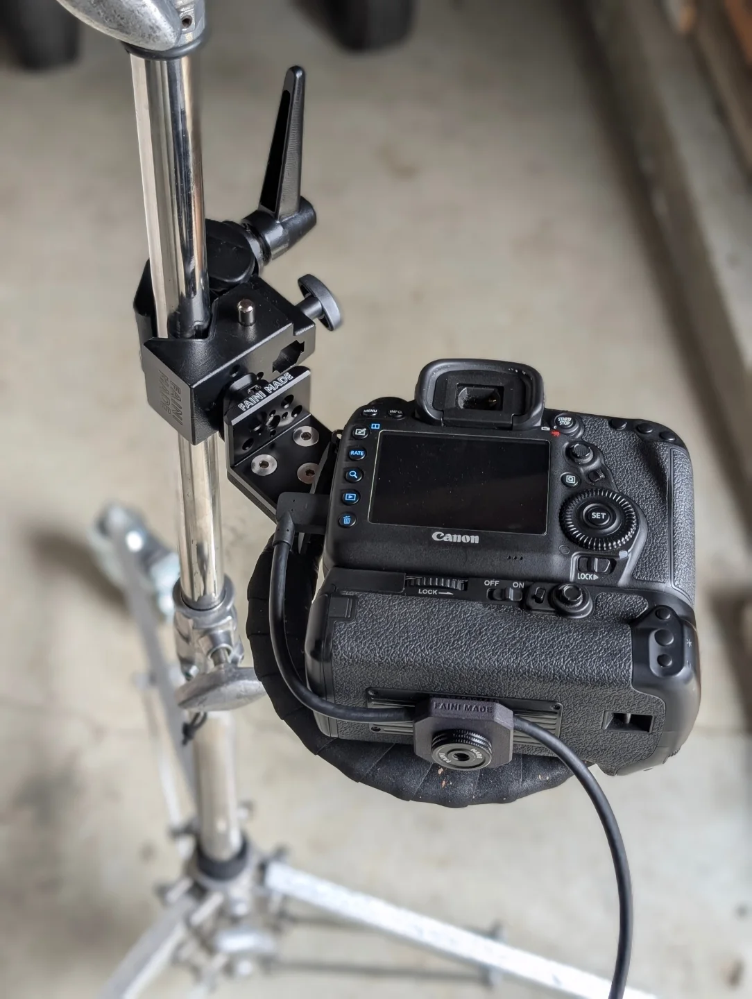 Camera Holster mounted to a C-stand on set